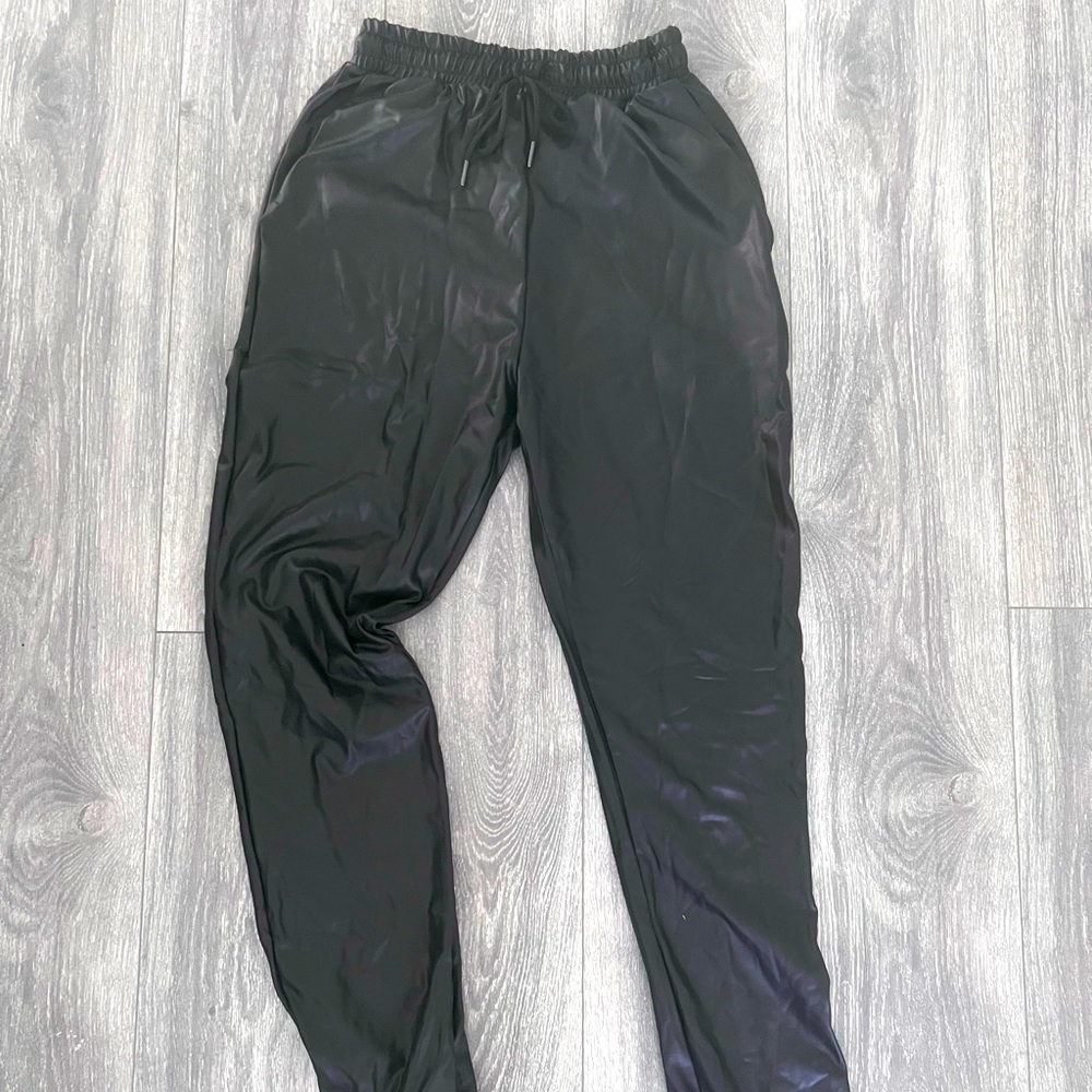 ASOS tall Faux leather joggers. Relaxed fit and stretchy. Never Worn